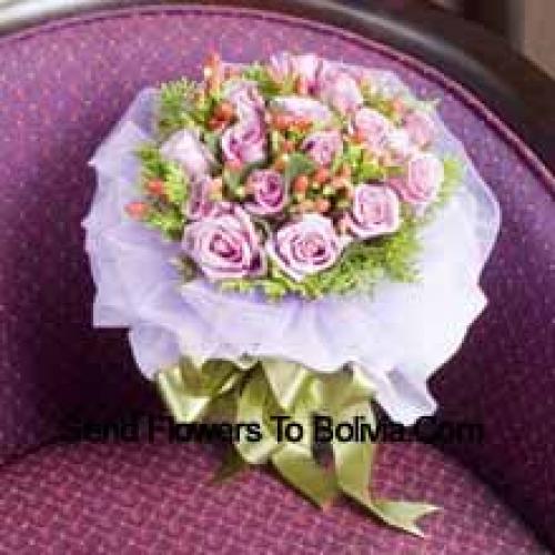 11 Light Pink Wrapped Roses